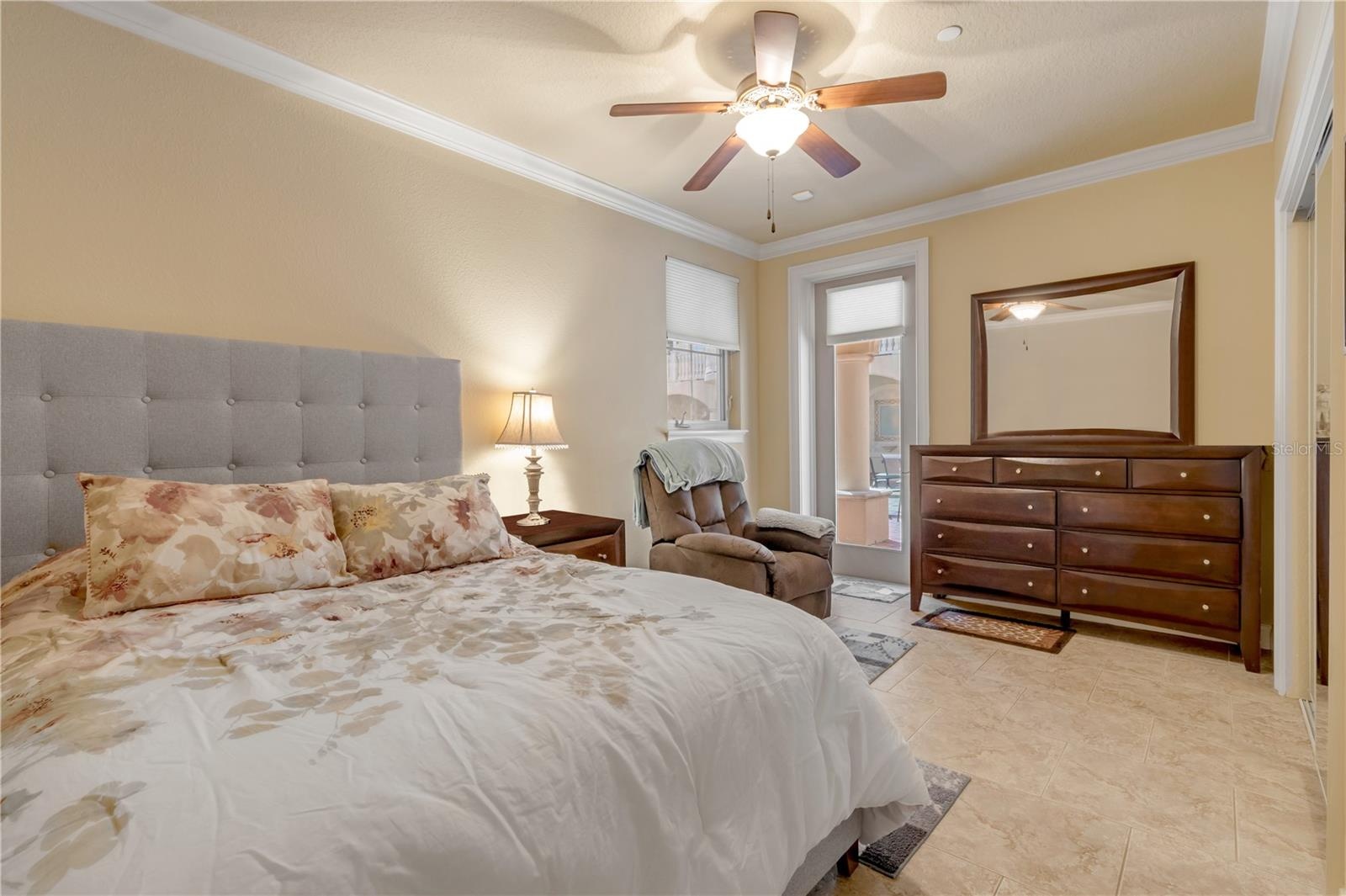 Guest Bedroom with exterior door to pool area