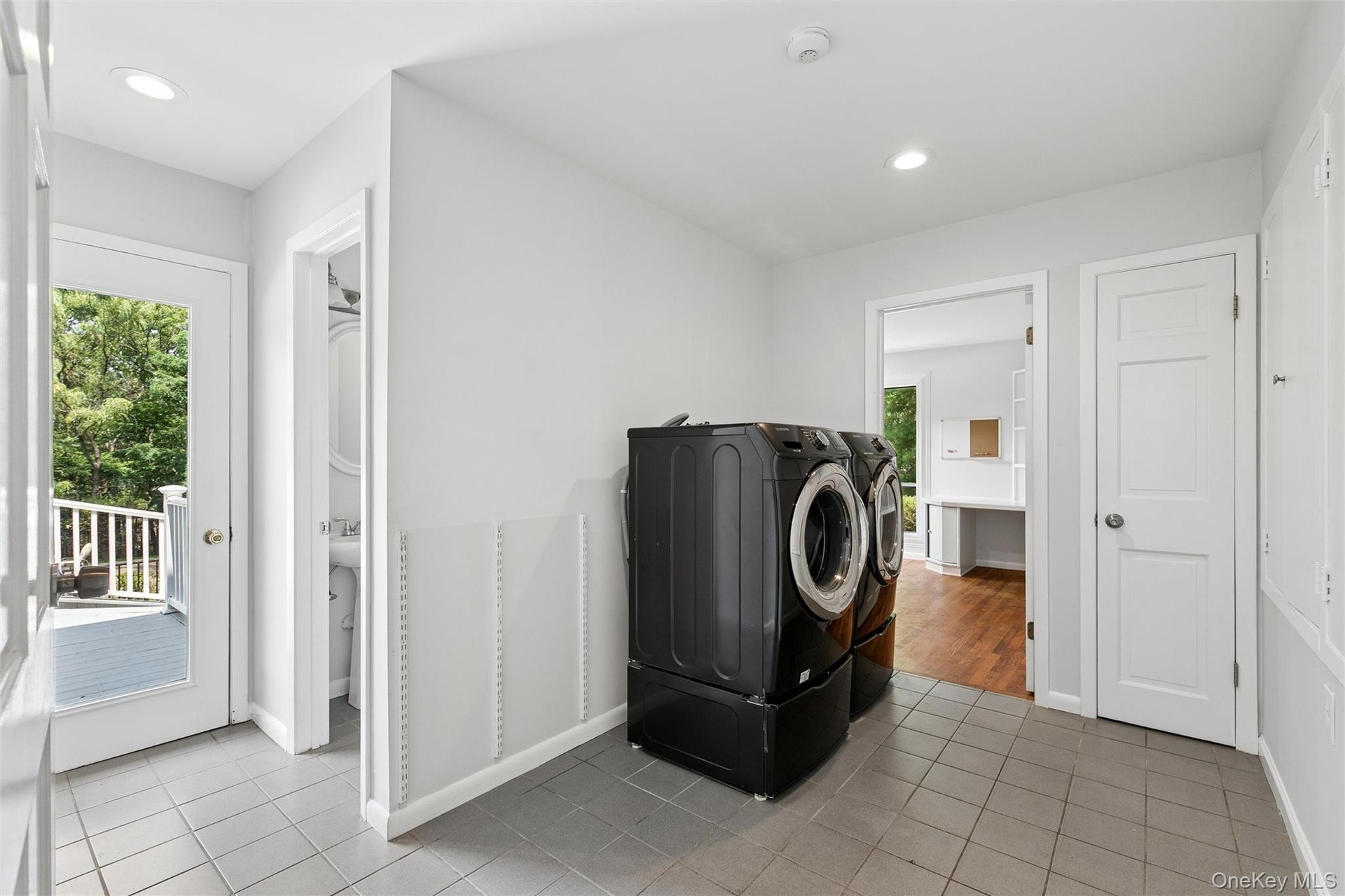 Wing with laundry, full bath and office or 5th bedroom