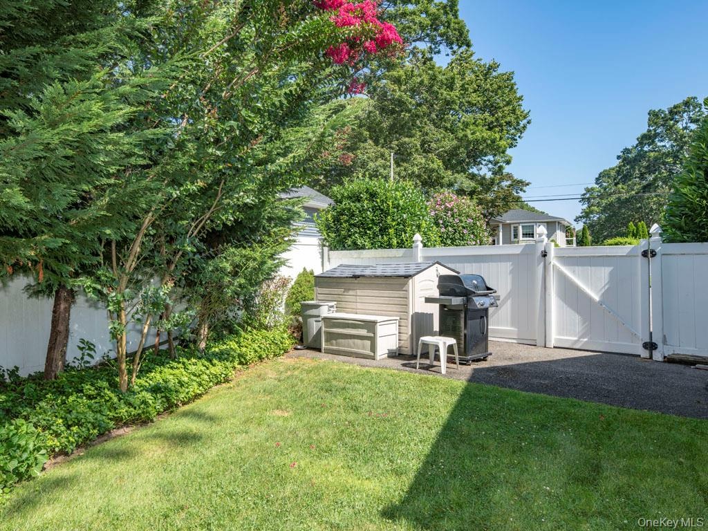 View of yard with a gate