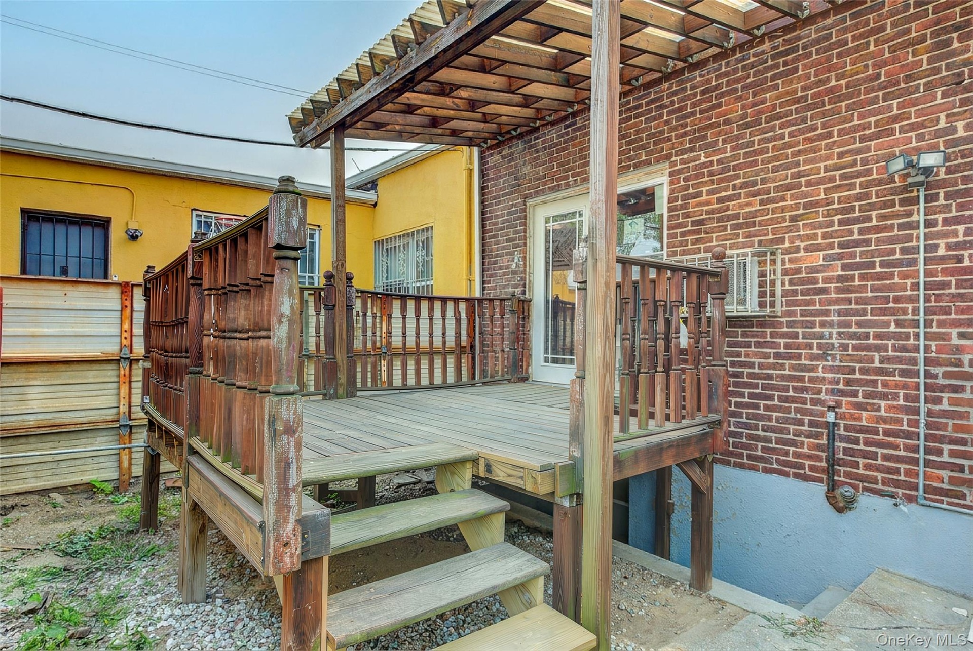 Backyard porch/ back entrance to basement