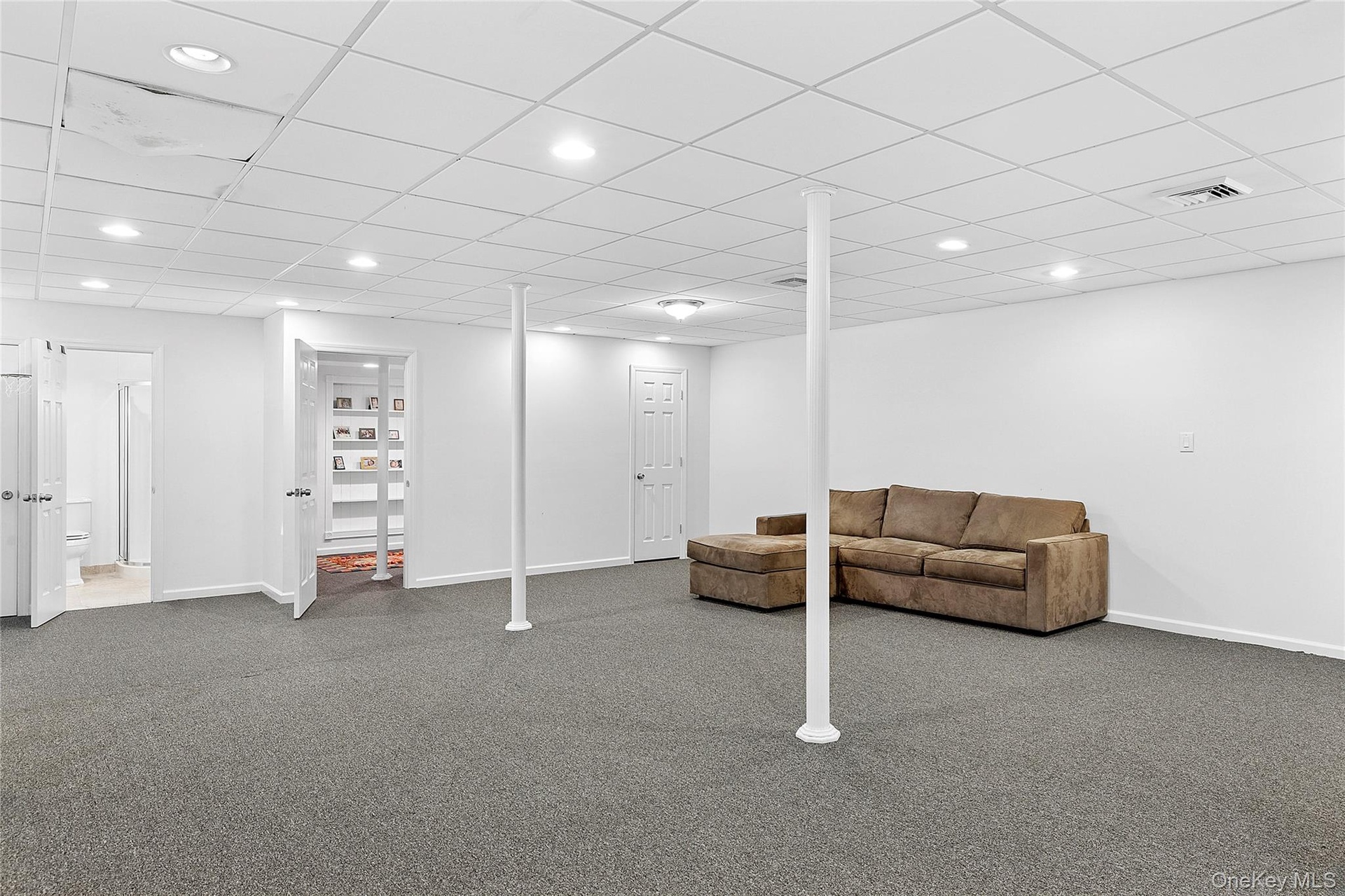 Basement with full bath, bedroom, recreational room, cedar closet, storage closets