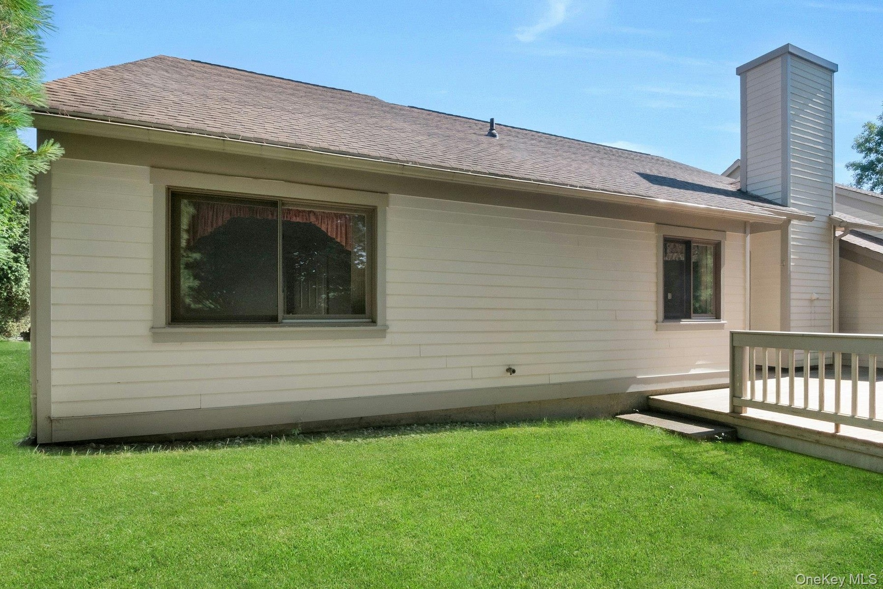 Very convenient access to the deck area and yard either from the side of the home or the deck!