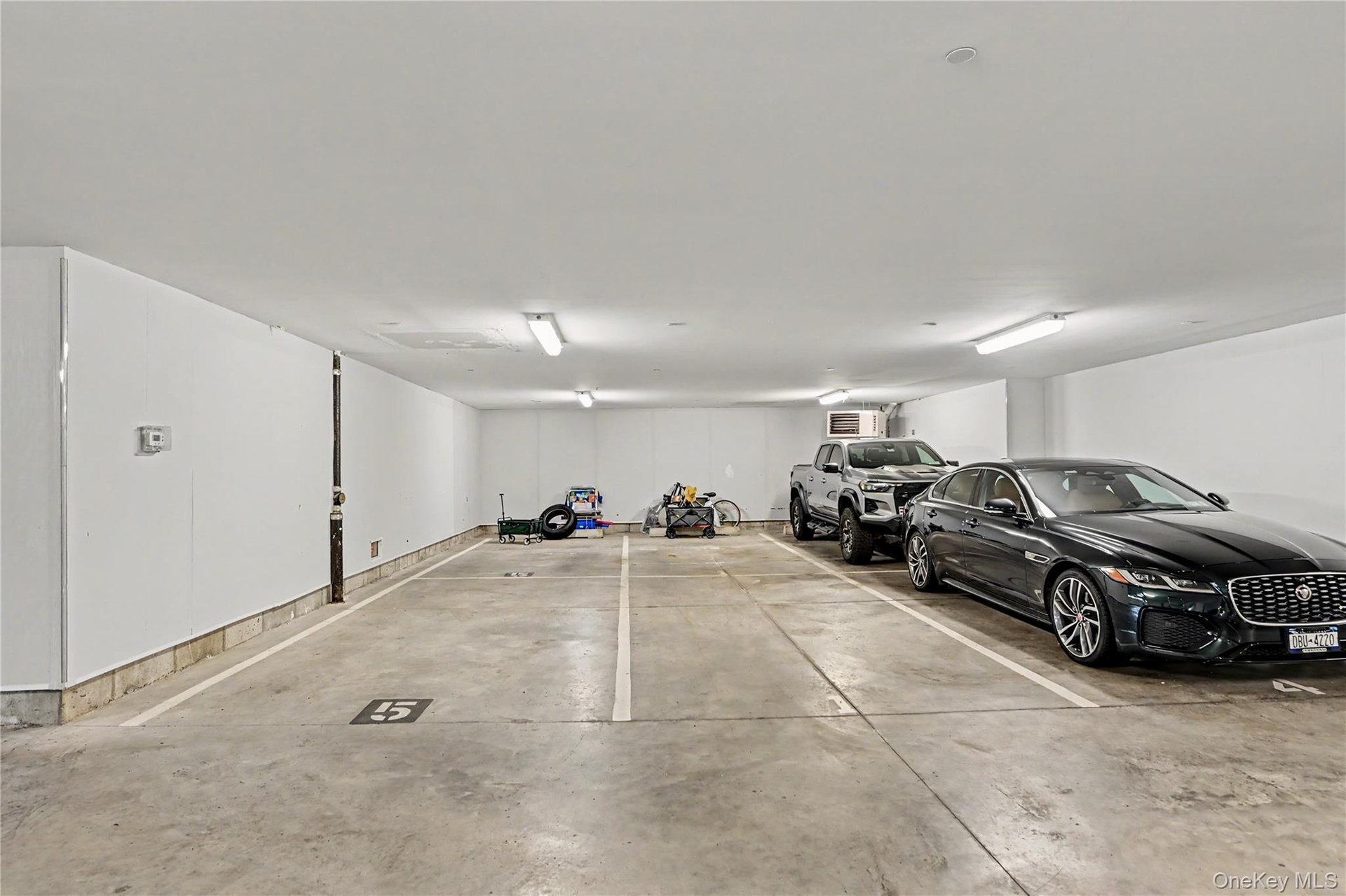 Assigned two car tandem space -center slot in photo