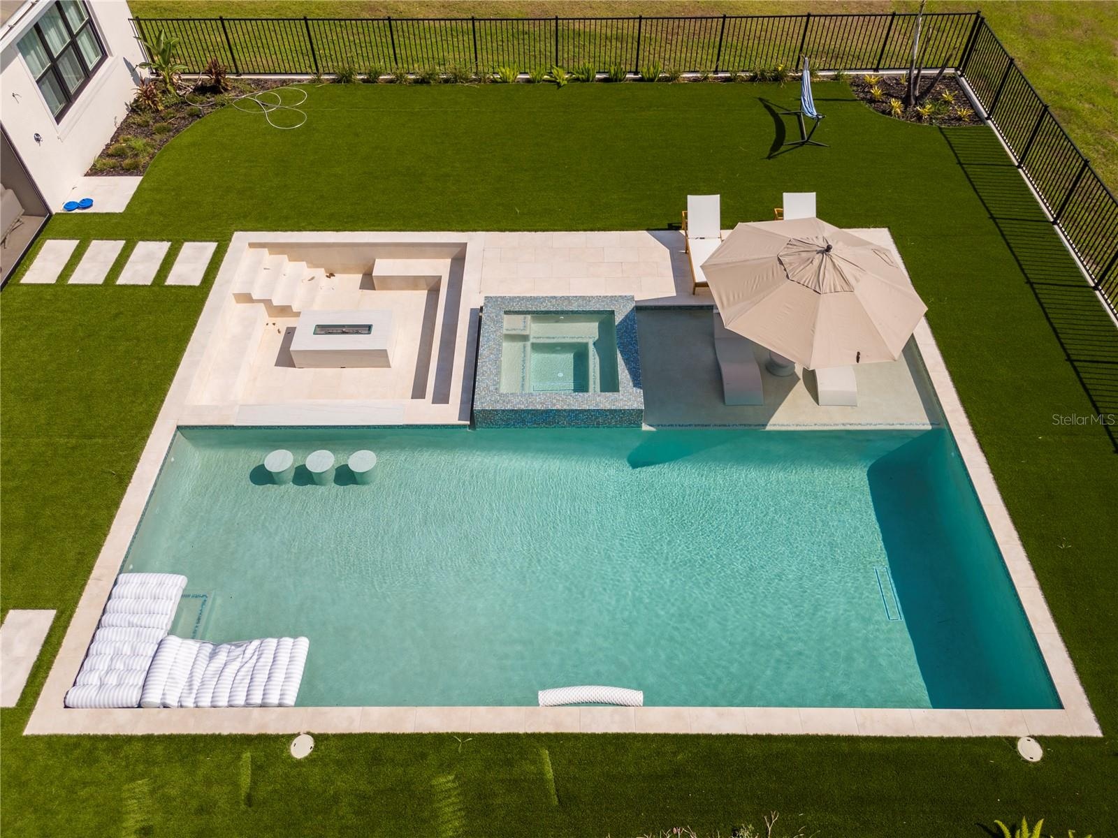 Pool with spa and fire pit