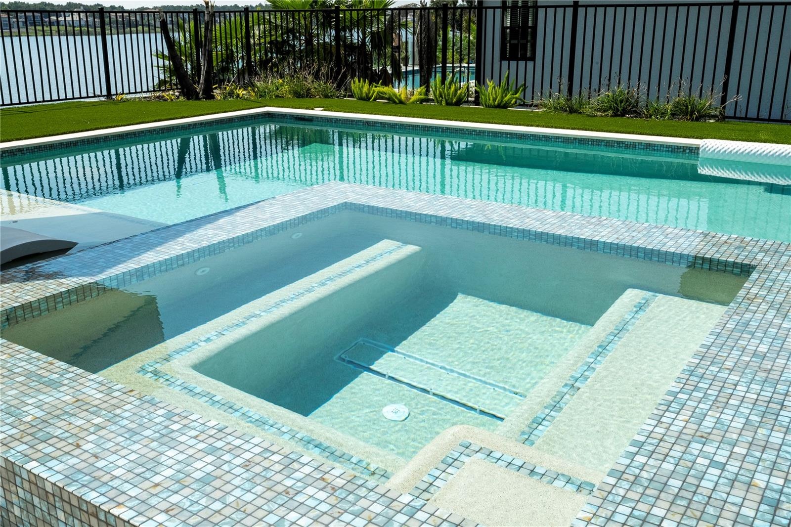 Pool with spa and fire pit