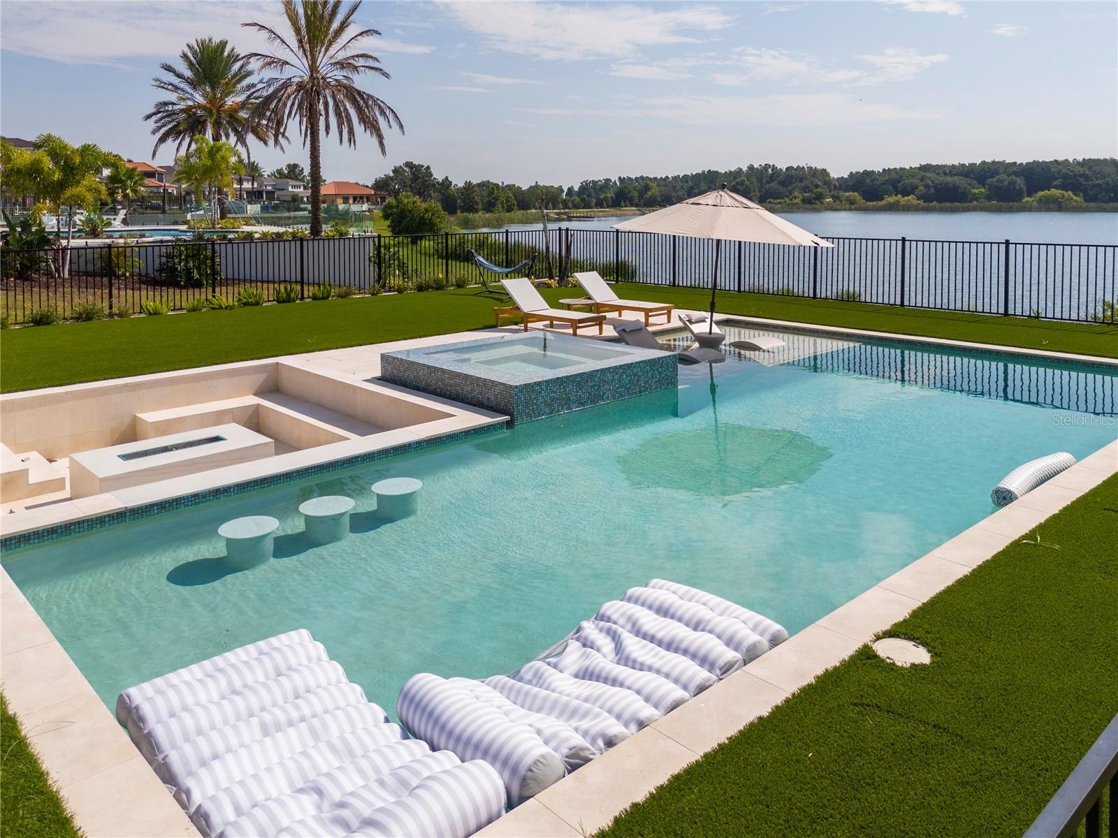 Pool with spa and fire pit