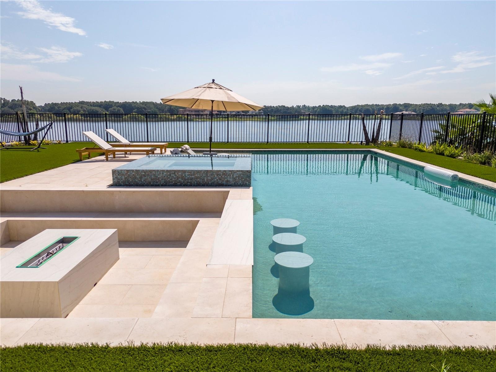 Pool with spa and fire pit