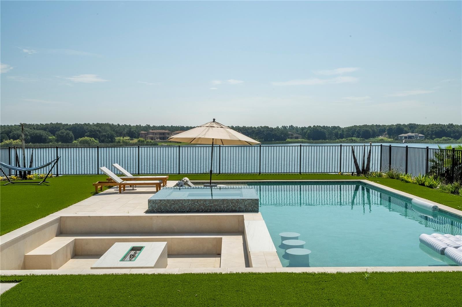 Pool with spa and fire pit