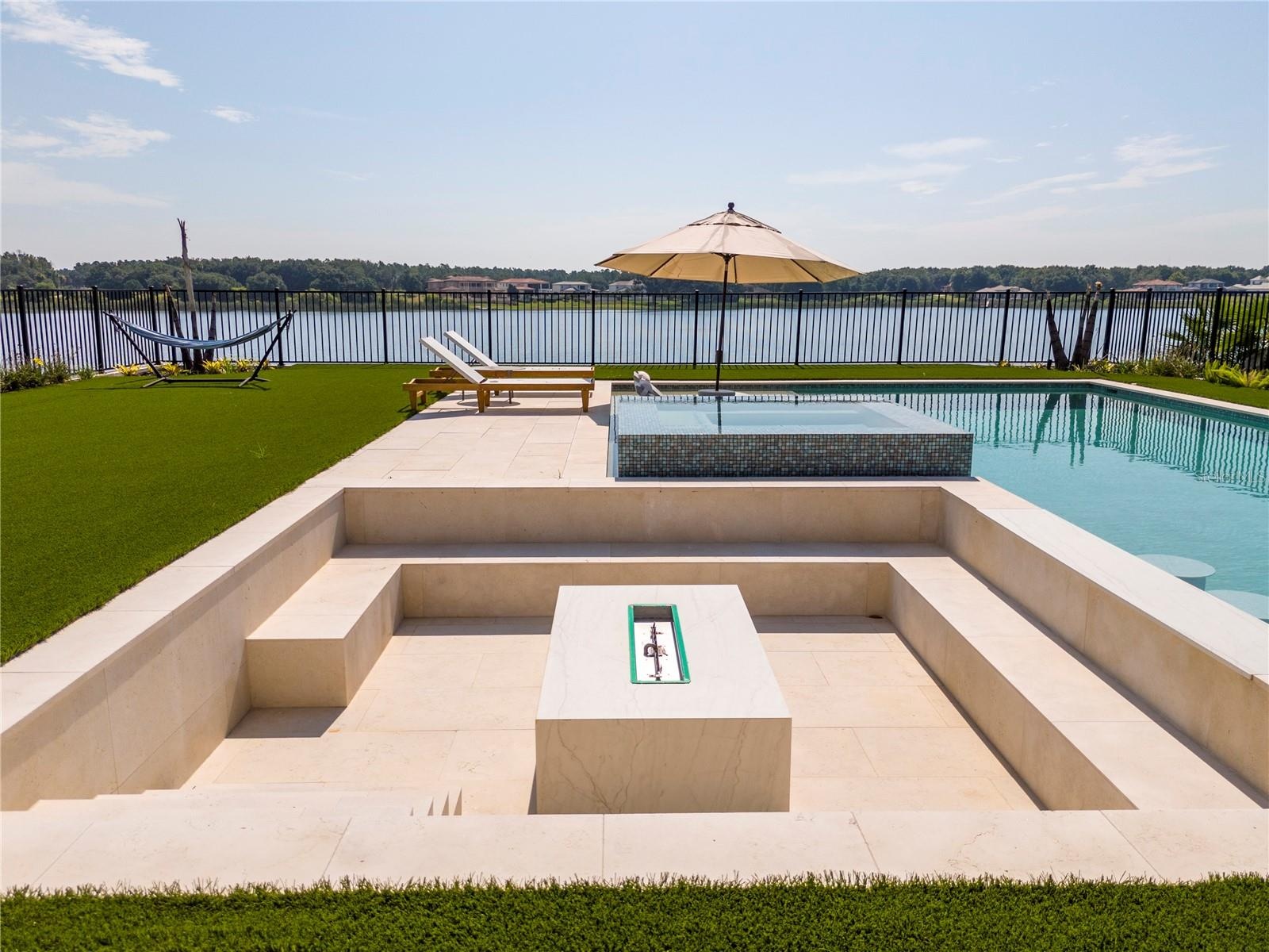Pool with spa and fire pit