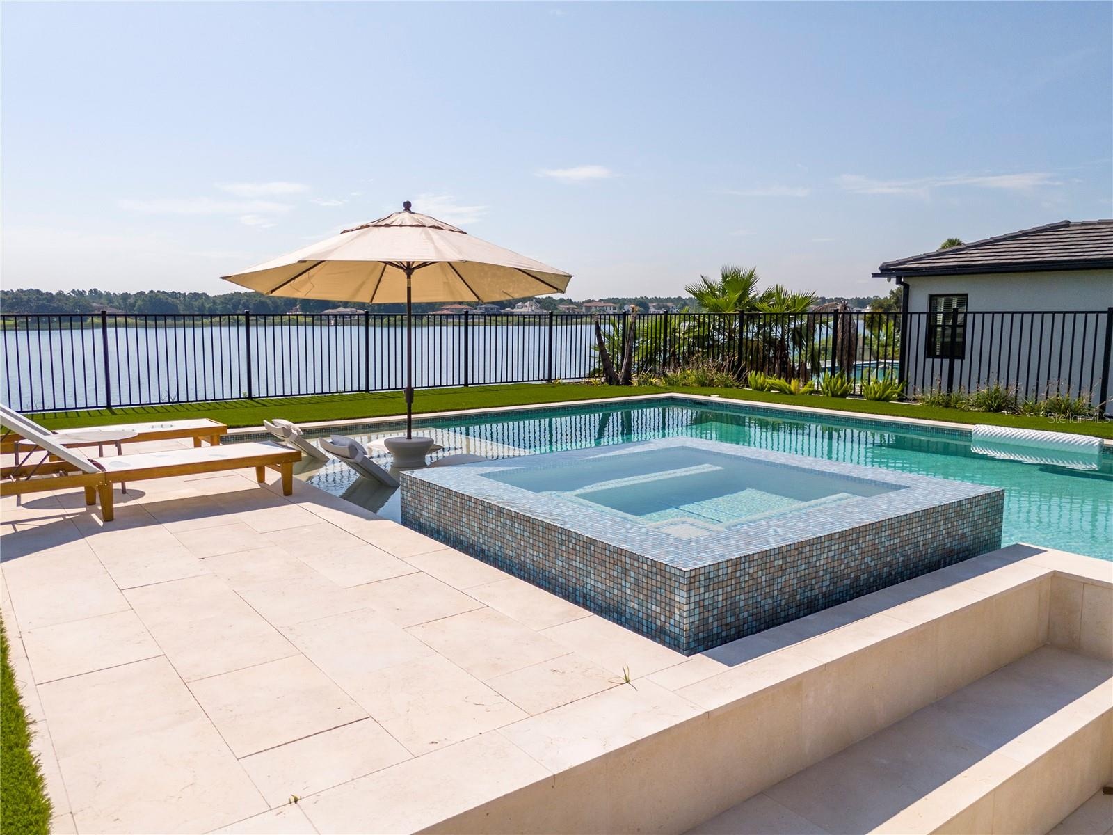 Pool with spa and fire pit