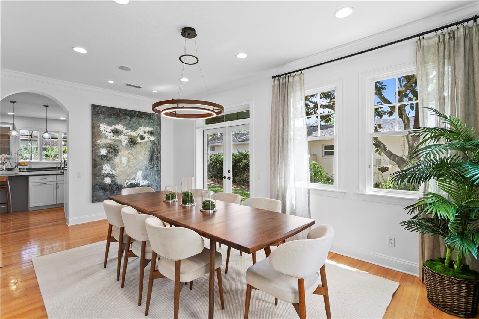 Elegant archways & custom millwork trim showcase the home’s exceptional build quality