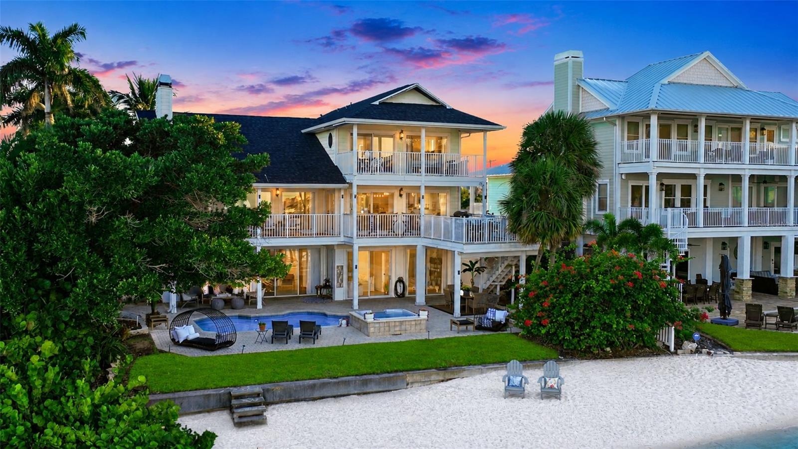 Private sandy beach on Boca Ciega Bay – your backyard paradise.