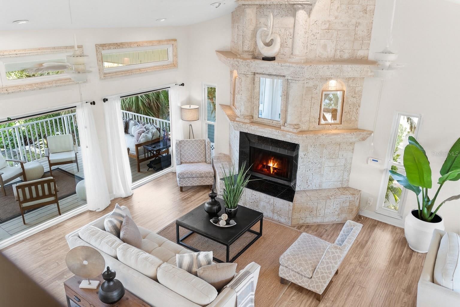 Open-concept great room with soaring 20-foot ceilings