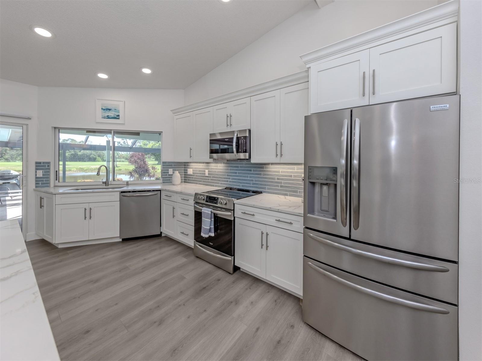The beautifully updated kitchen is a chef's dream!