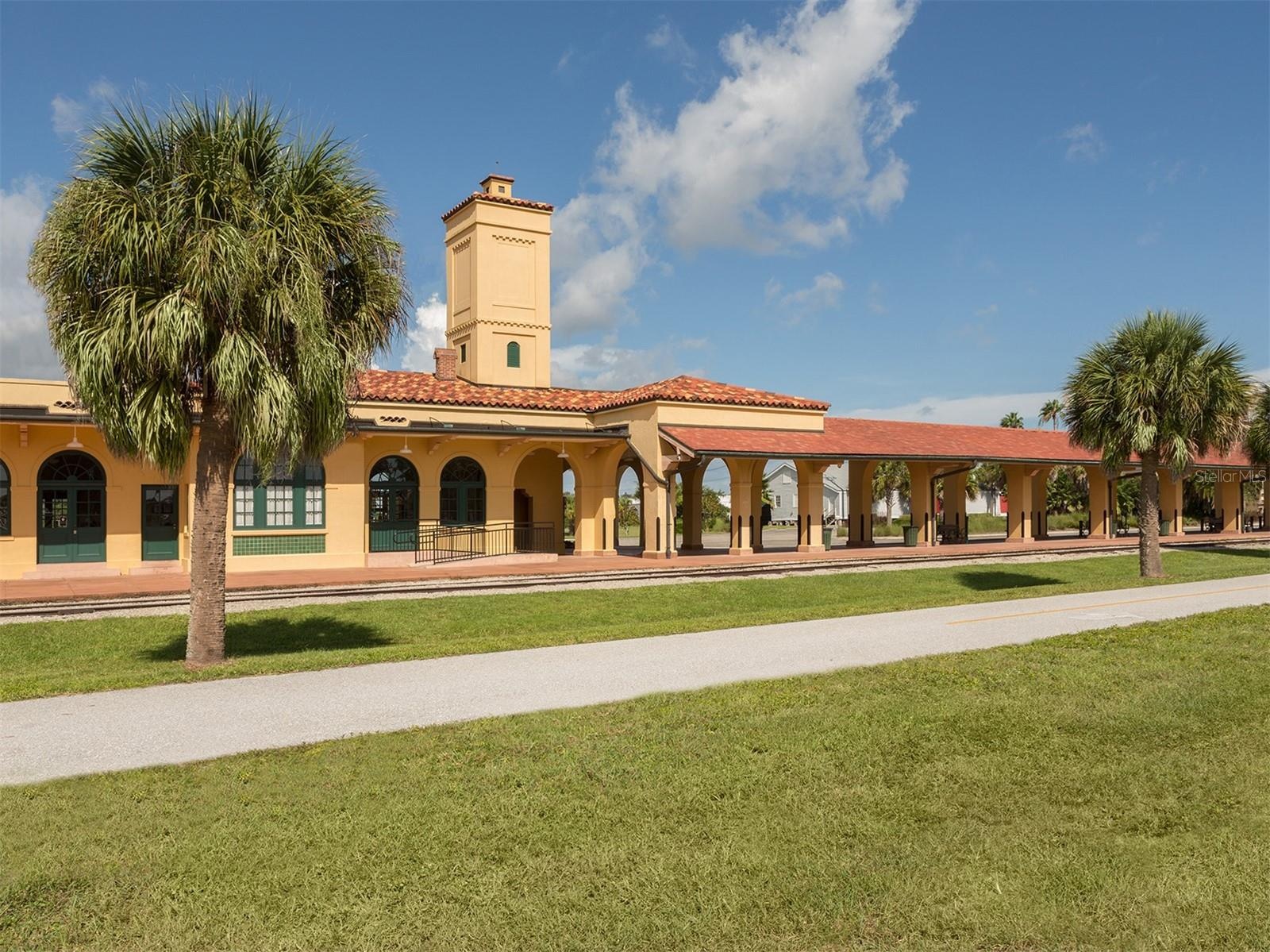 The historical train station sits on the Intercostal and the Legacy Trail Bike Path runs right in front of it