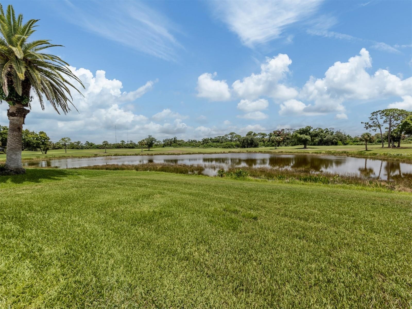 This home offers beautiful water and golf course views