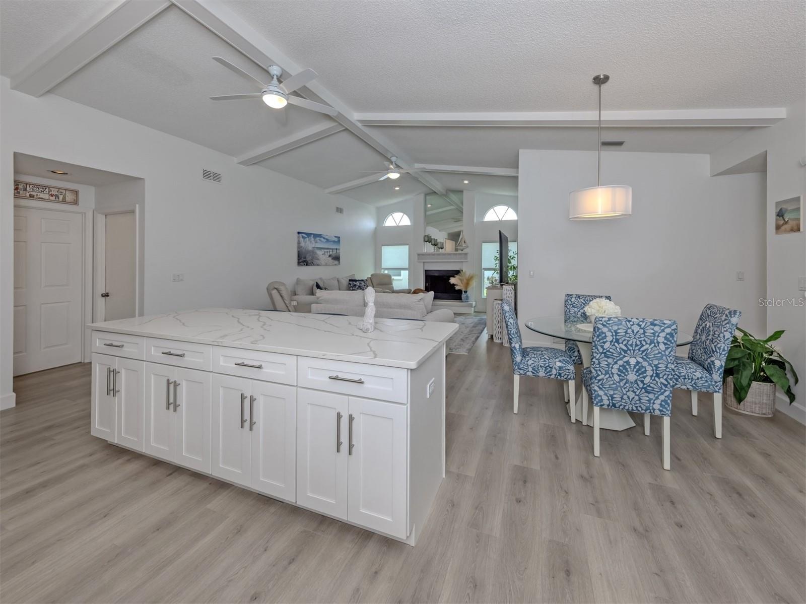 Perfectly redesigned kitchen overlooks the dinette and family room
