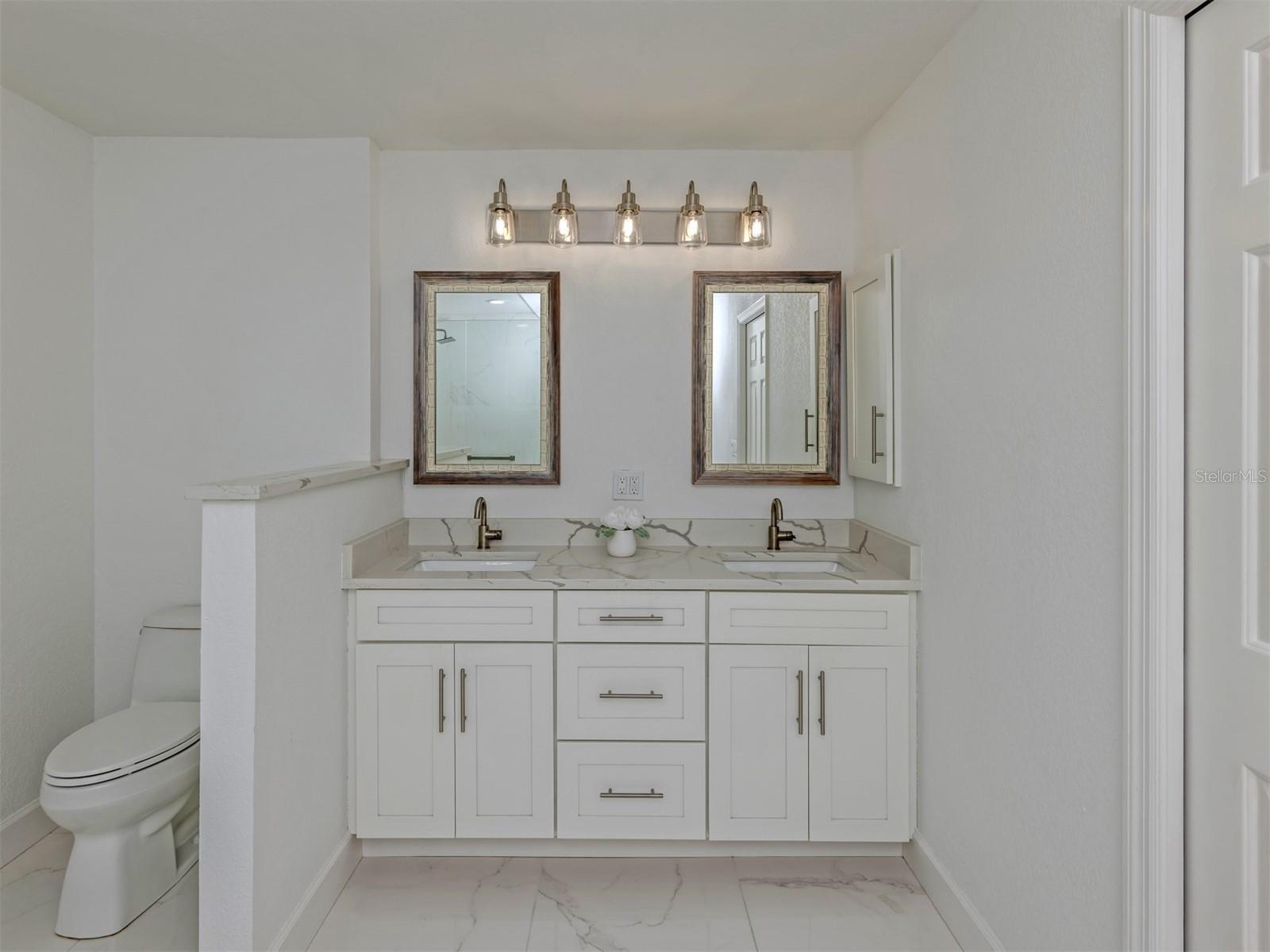 The primary bathroom provides the owners with a spa like experience