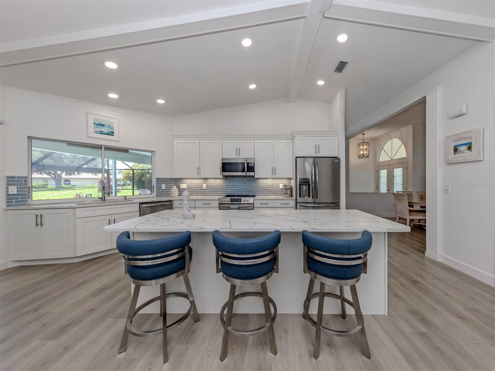 This large modern kitchen is the heart of this home