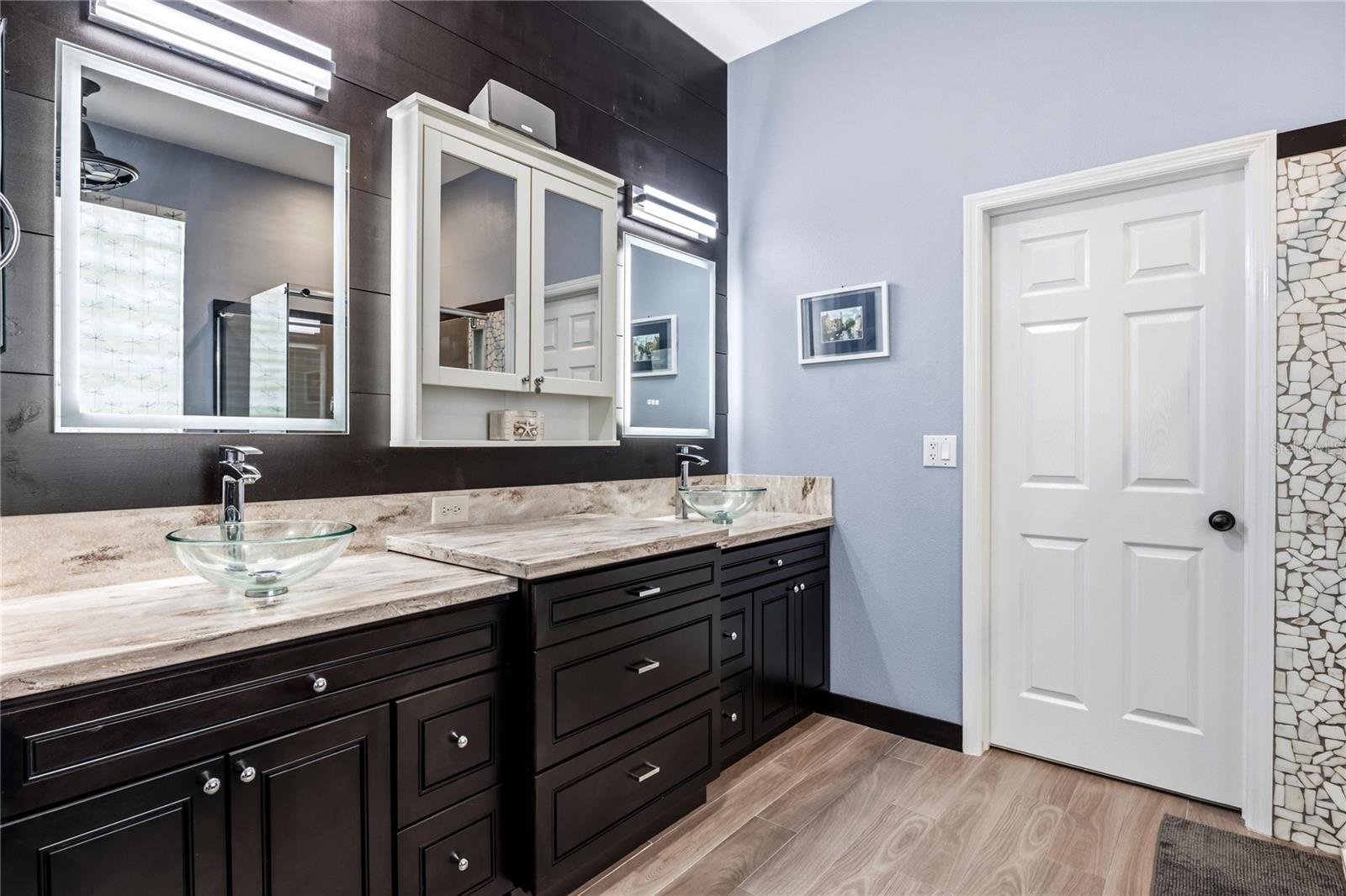 Primary Bath with dual glass bowl sinks!