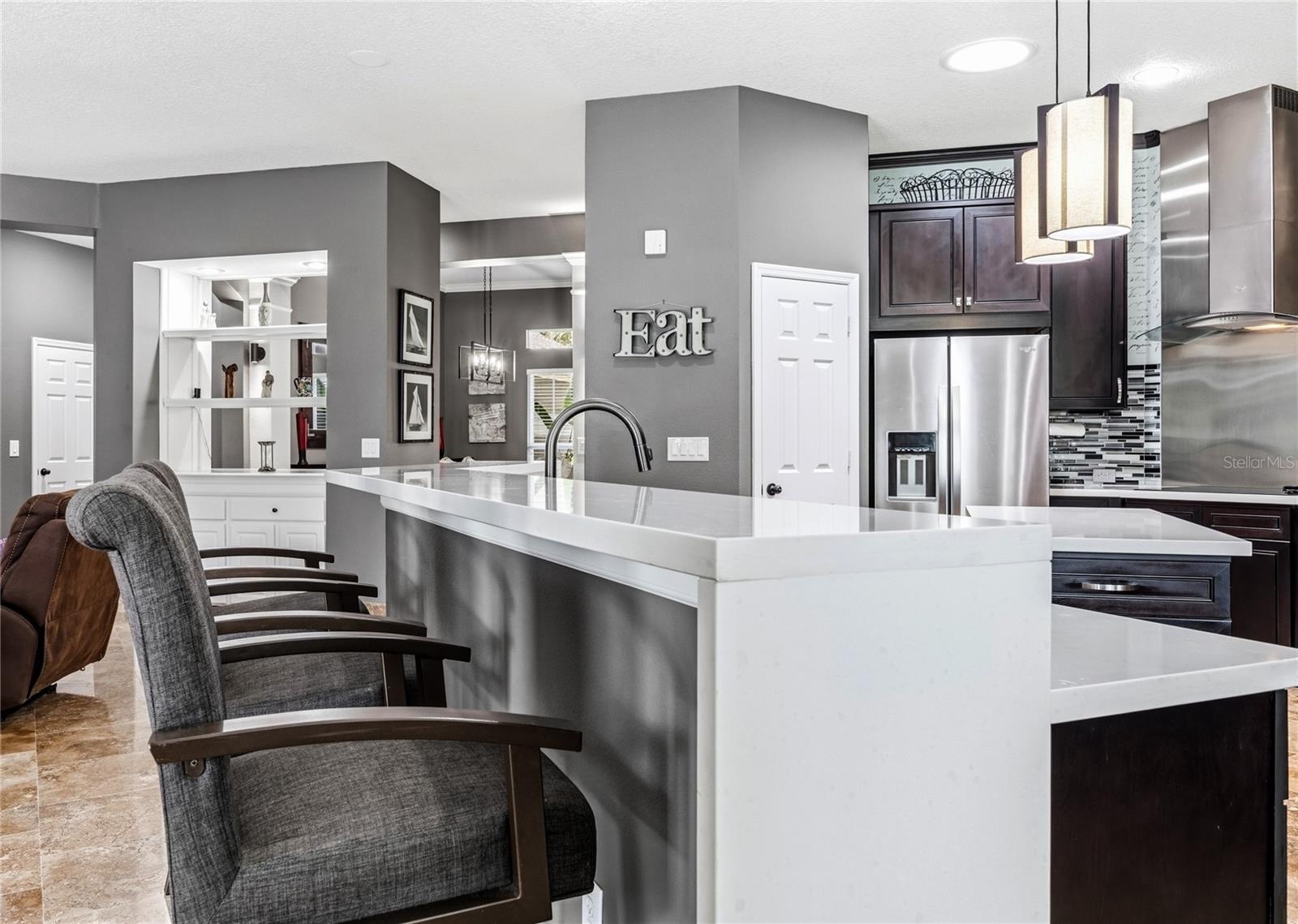 Quartz counters highlight the Breakfast Bar area!