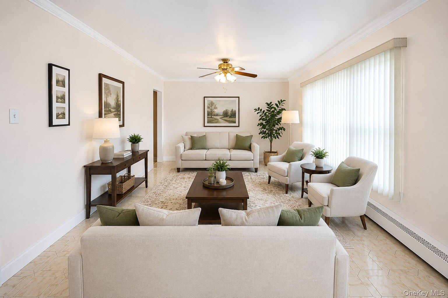 VIRTUALLY STAGED. Spacious living area featuring light-toned walls, crown molding, and tiled flooring
