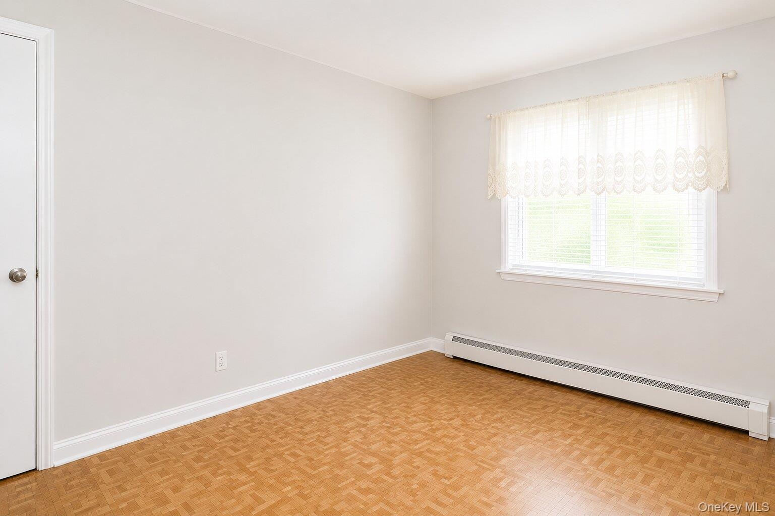 Bright interior with patterned wood-finish flooring