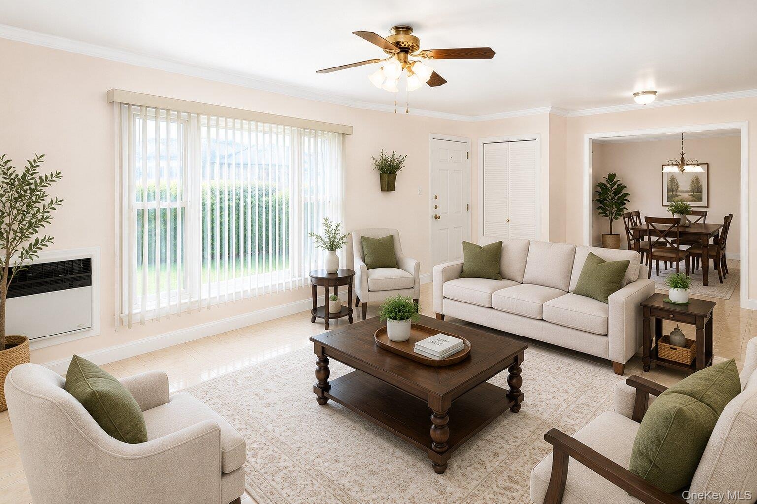 VIRTUALLY STAGED. Spacious living area featuring light-toned tile flooring and a ceiling fan