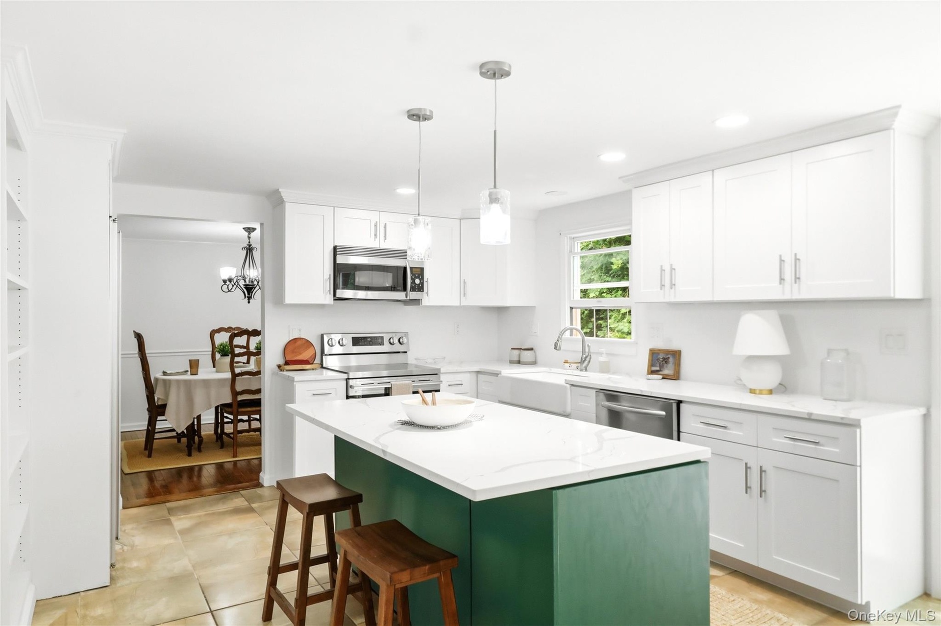 fun blue island pops against white cabinetry!