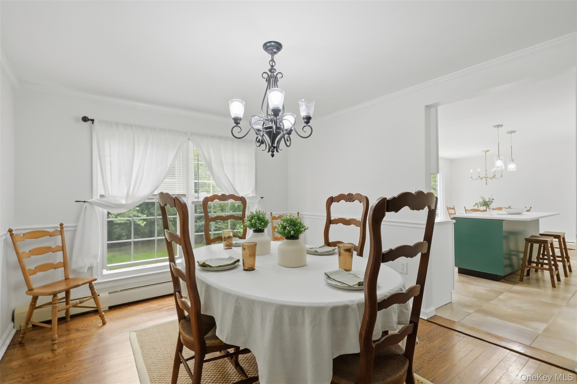 Lovely Formal Dining Room with double window overlooking back yard~