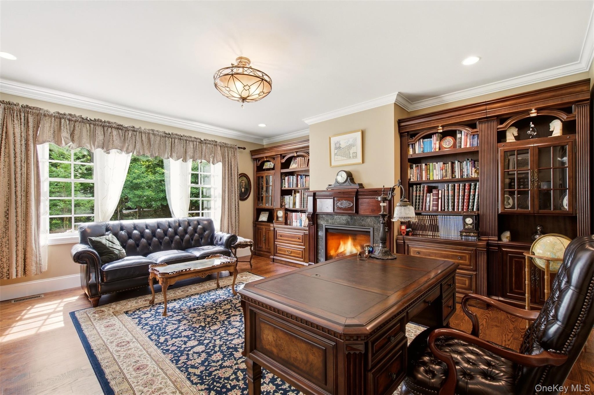 Library with fireplace