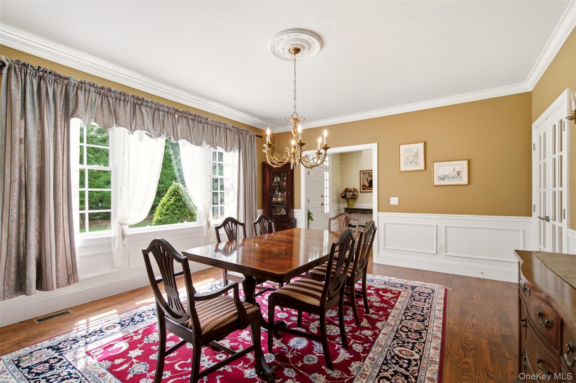 Formal dining room off foyer