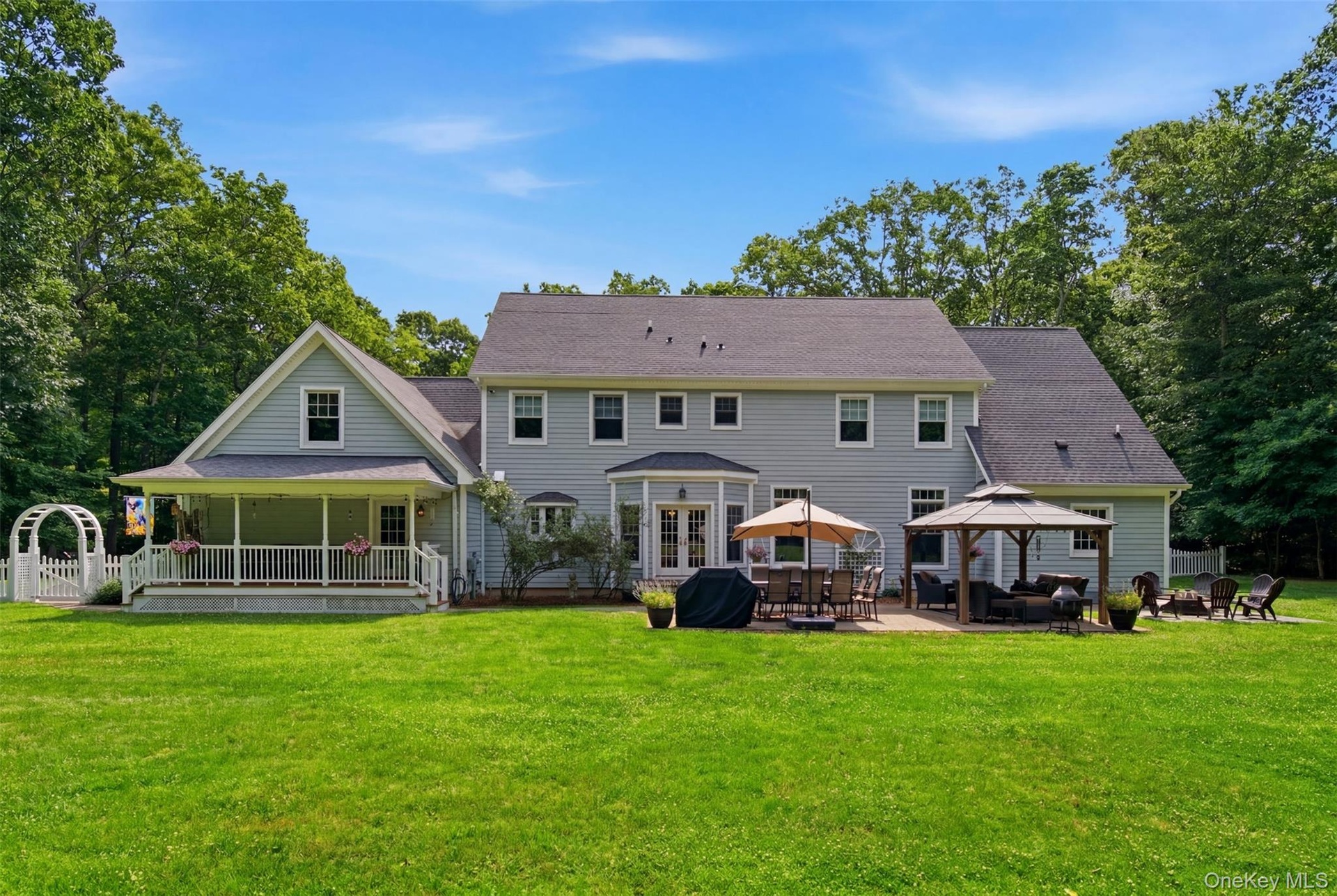 Rear property; flat with room for tennis and pool!
