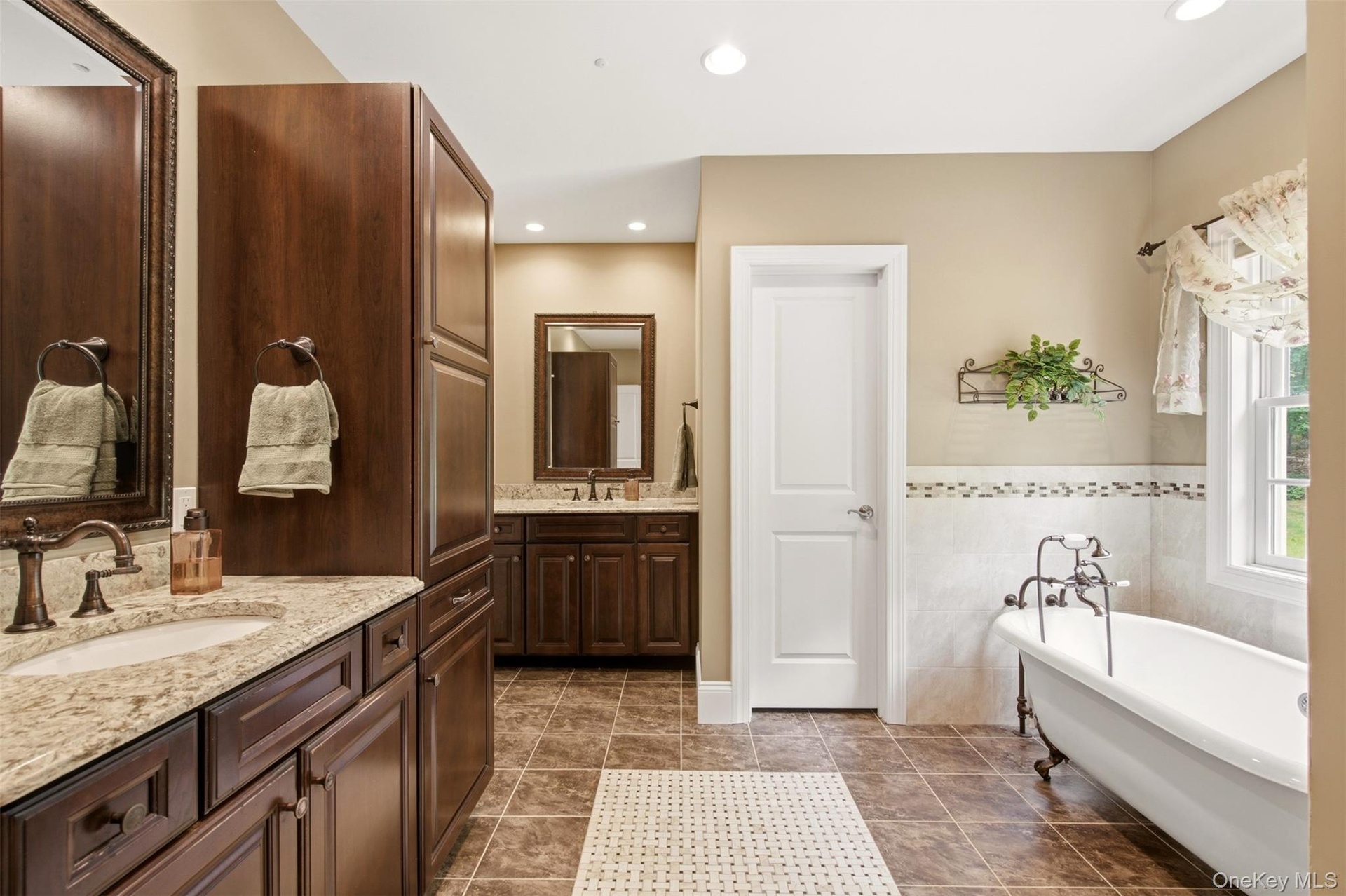 Free-standing tub, privacy toilet