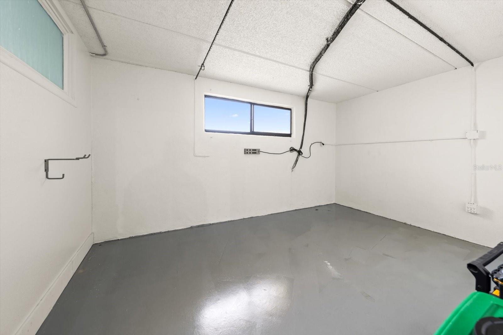 3 Car Garage w/Storage Room