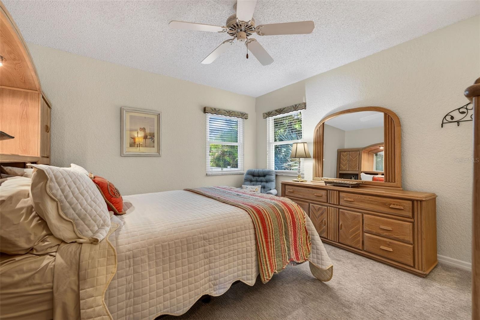 Large second bedroom includes a walk-in closet