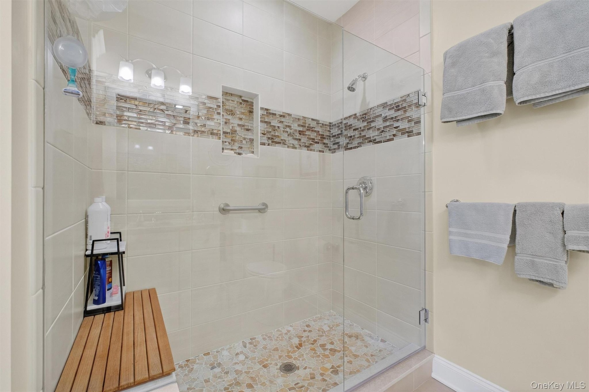 Bathroom featuring a shower stall