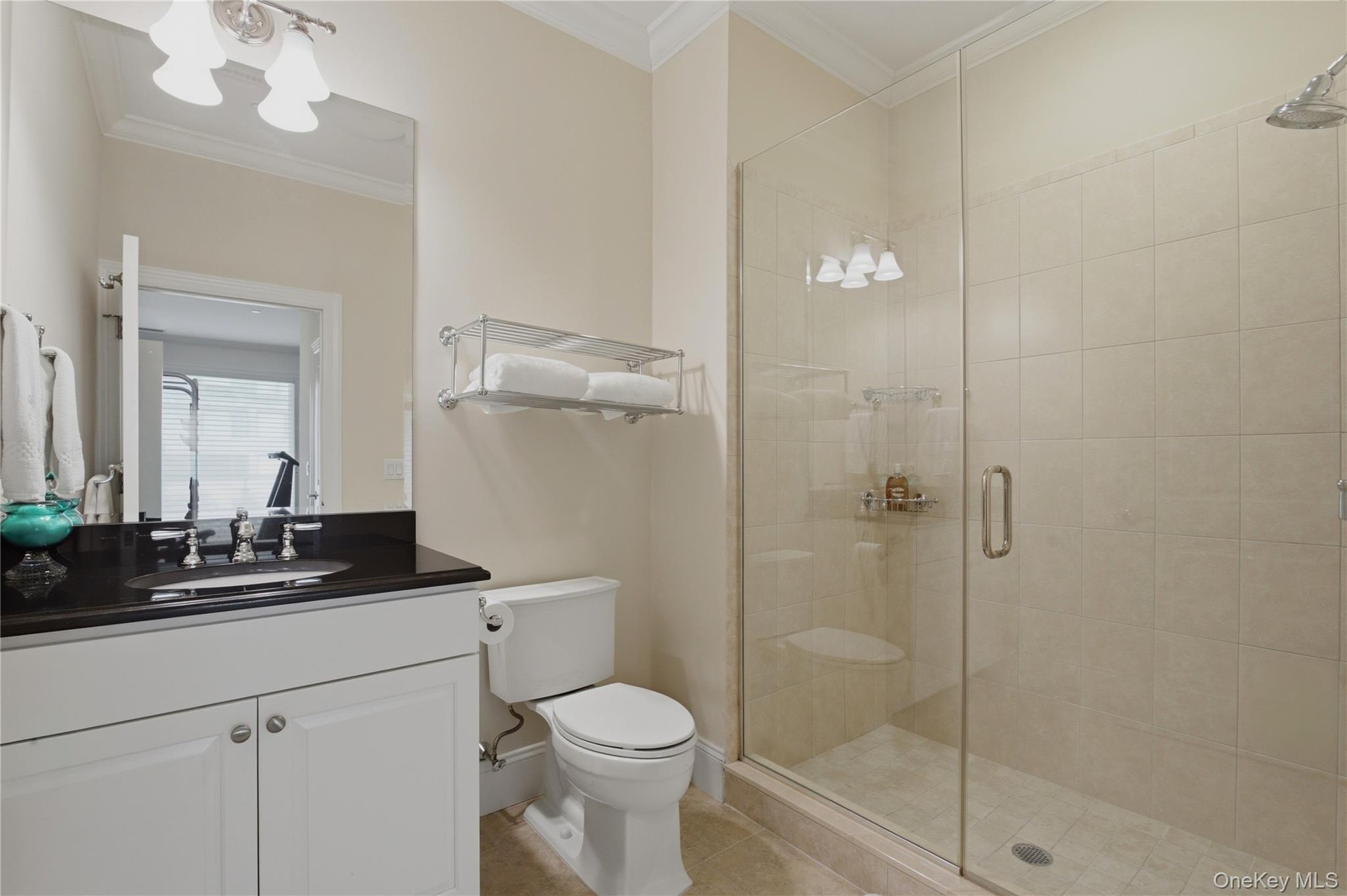 Full secondary bath with shower and tasteful finishes.