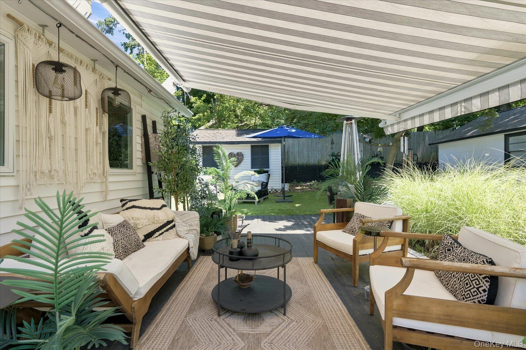 Retractable awning makes your deck like a private courtyard in all seasons and all types of weather