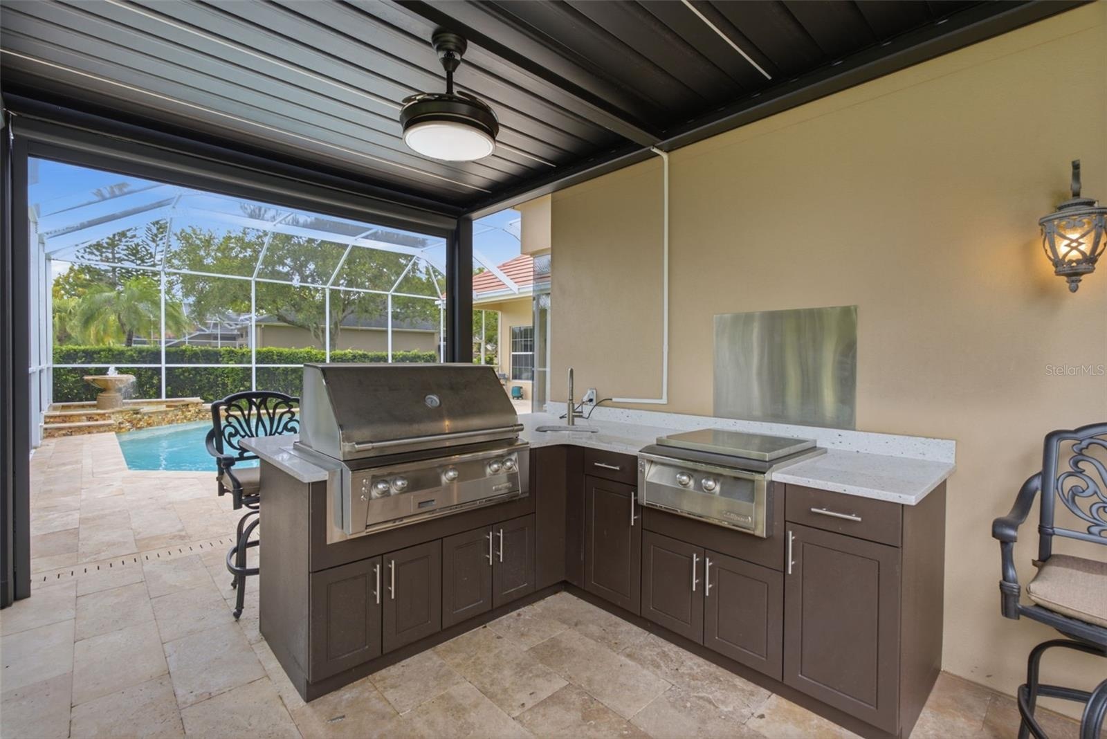 new outddor kitchen with grill and wok