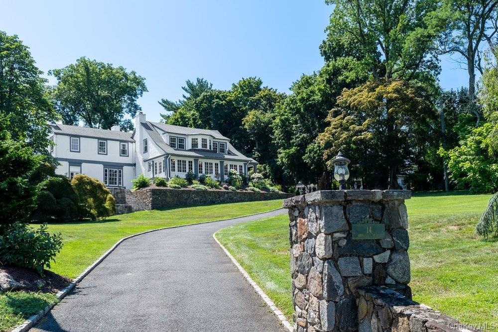 Luxury living overlooking the golf course in a grand colonial, where light and space elevate every moment