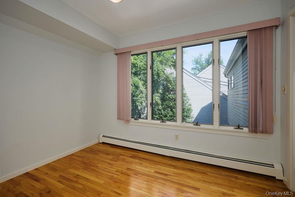 2nd Bedroom upstairs.  Beautiful hardwood floors