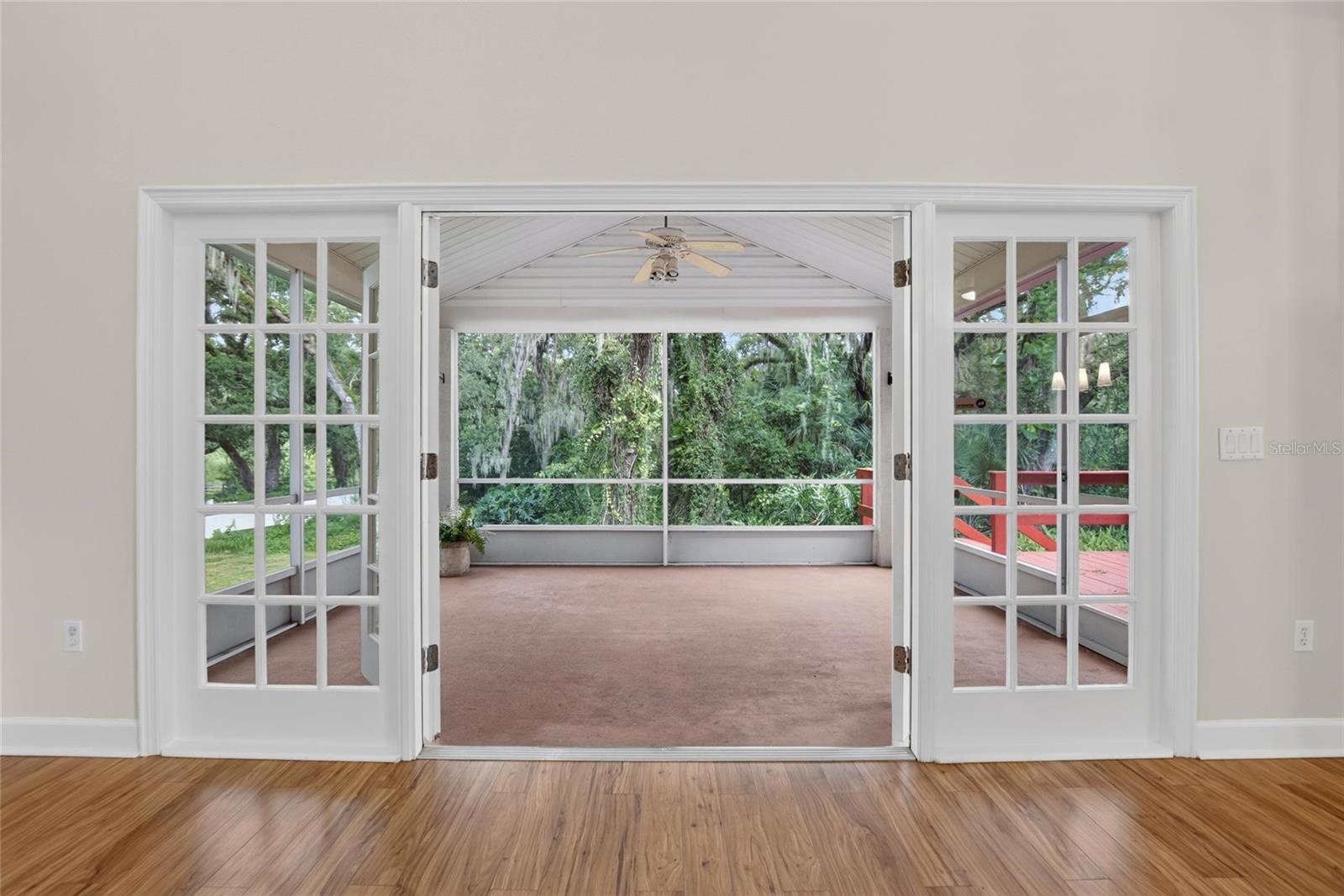 French Doors off of Living Room to Screened Back Porch