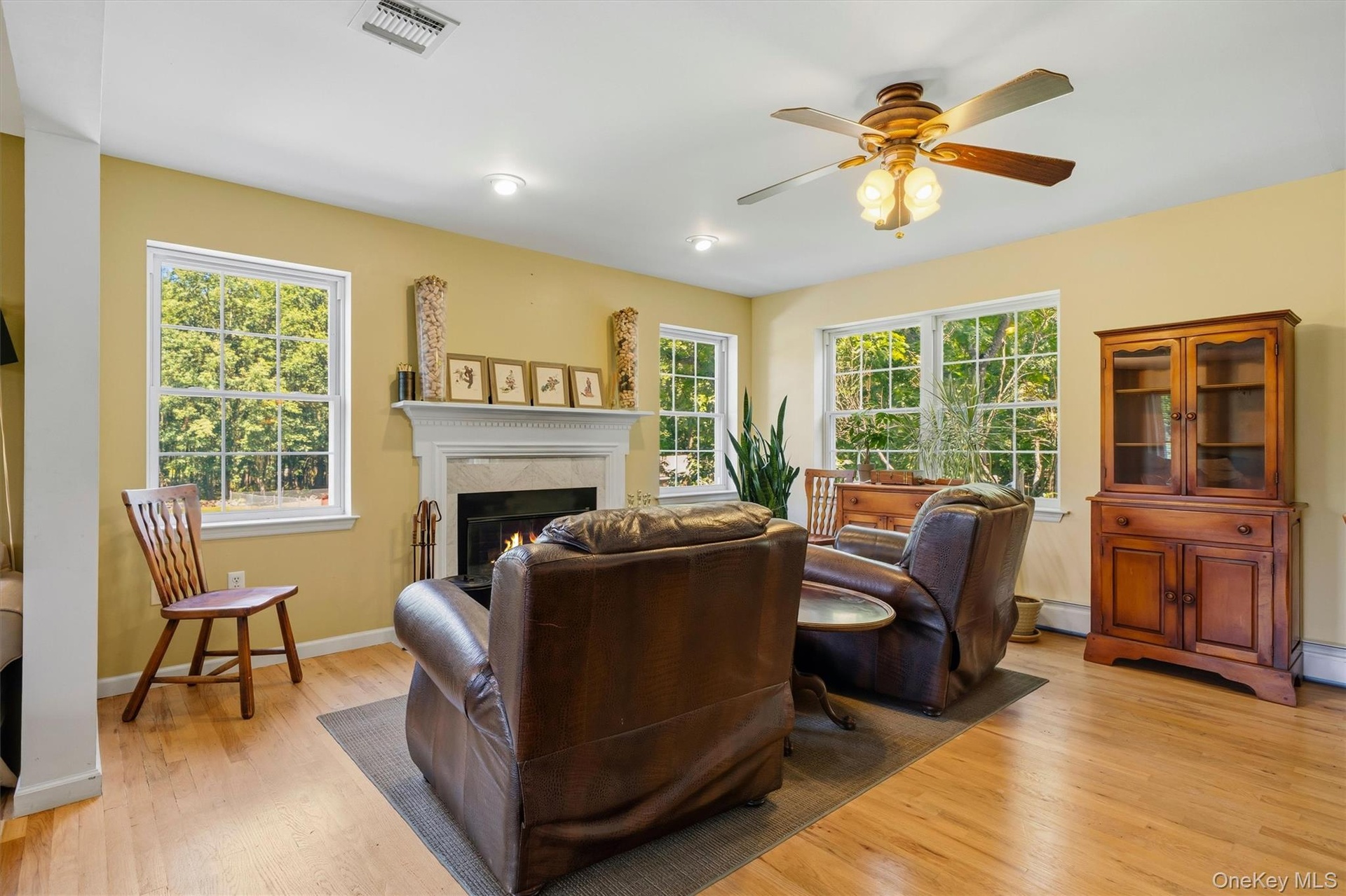 Warm and cozy family room with fireplace.