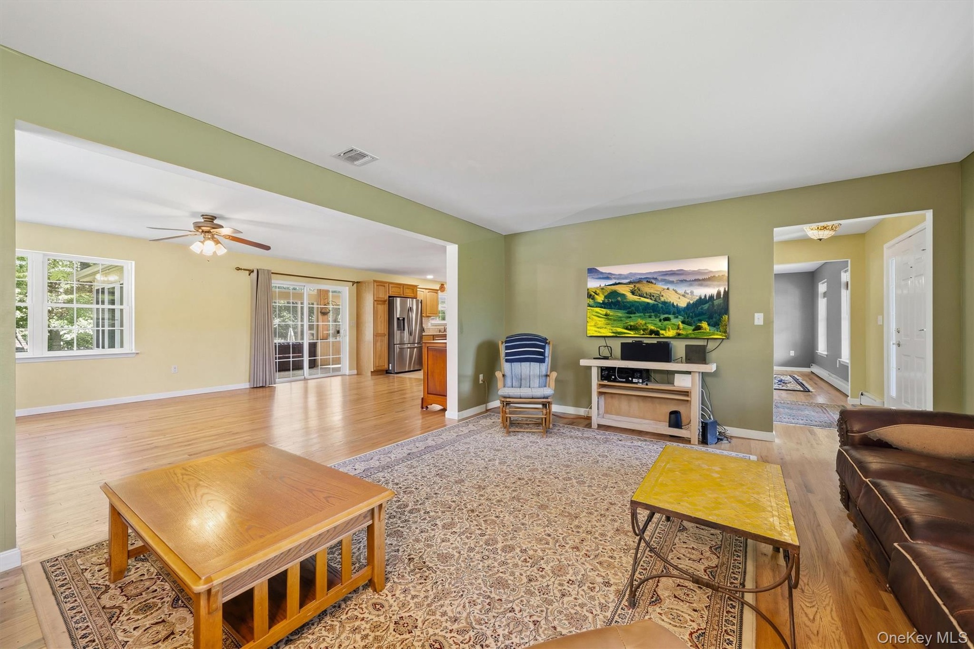 View from living room into the entry and family room.