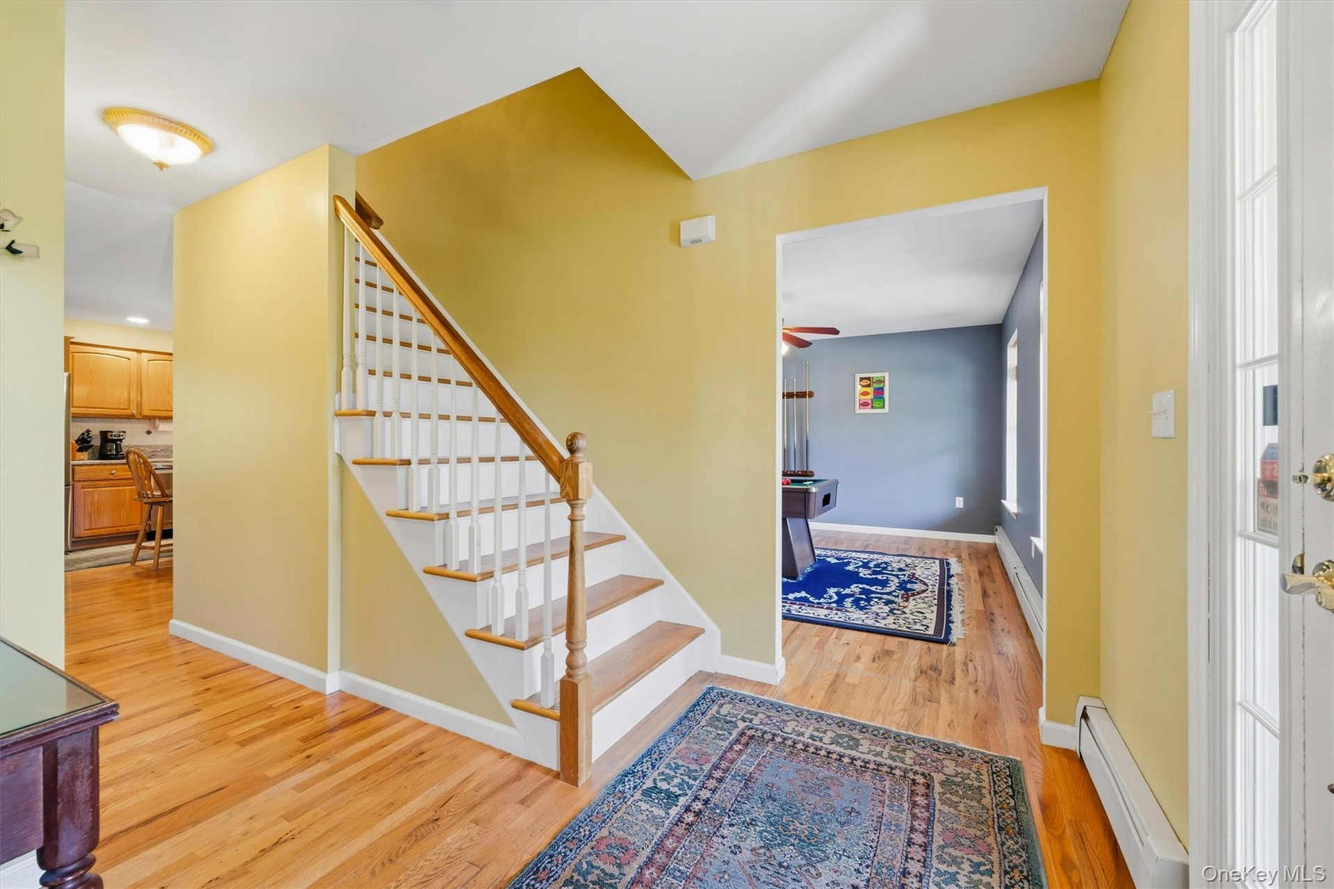 Entry showing the formal dining room.