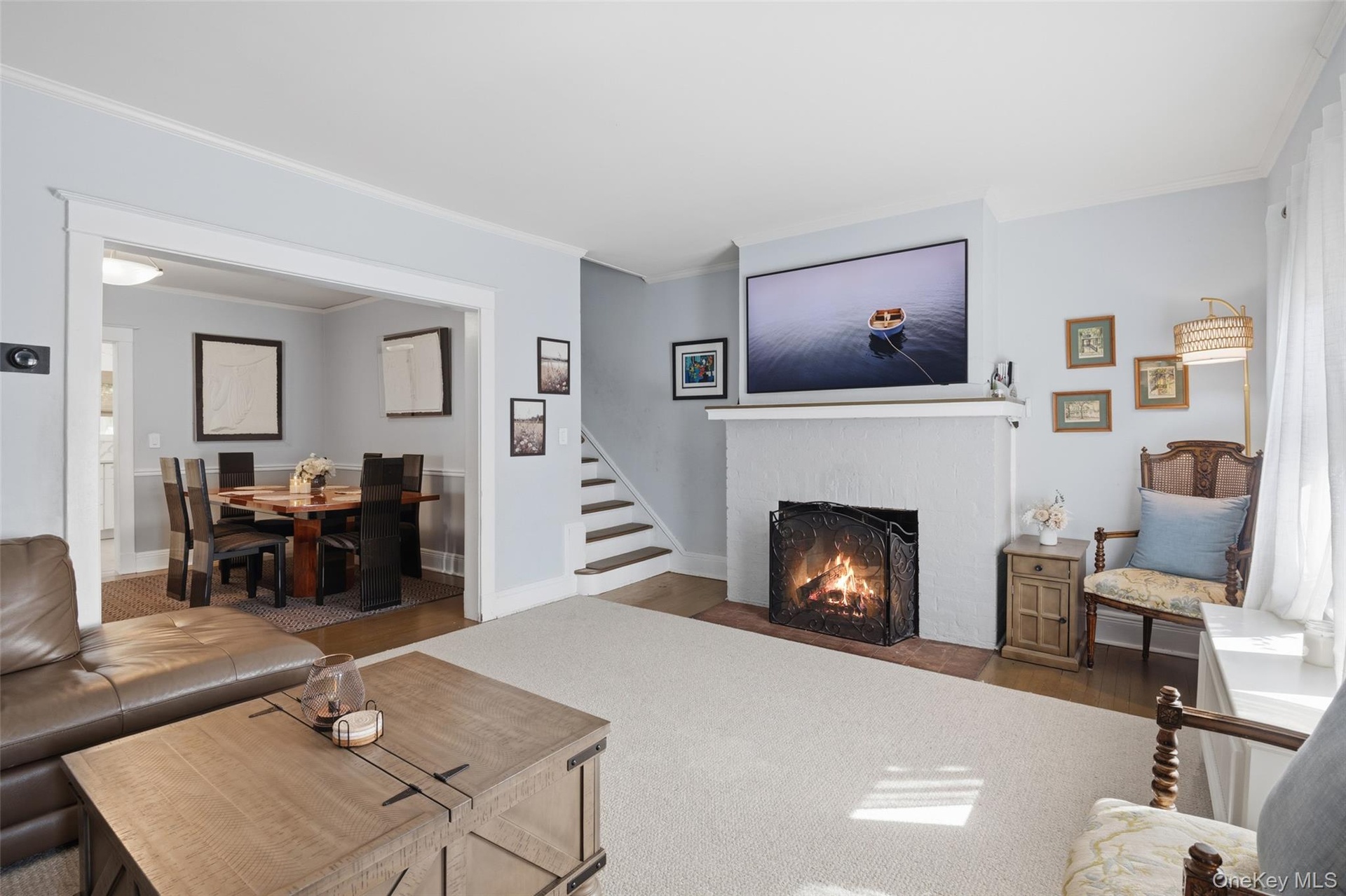 Another view of the living room coupled with the dining room (#220)