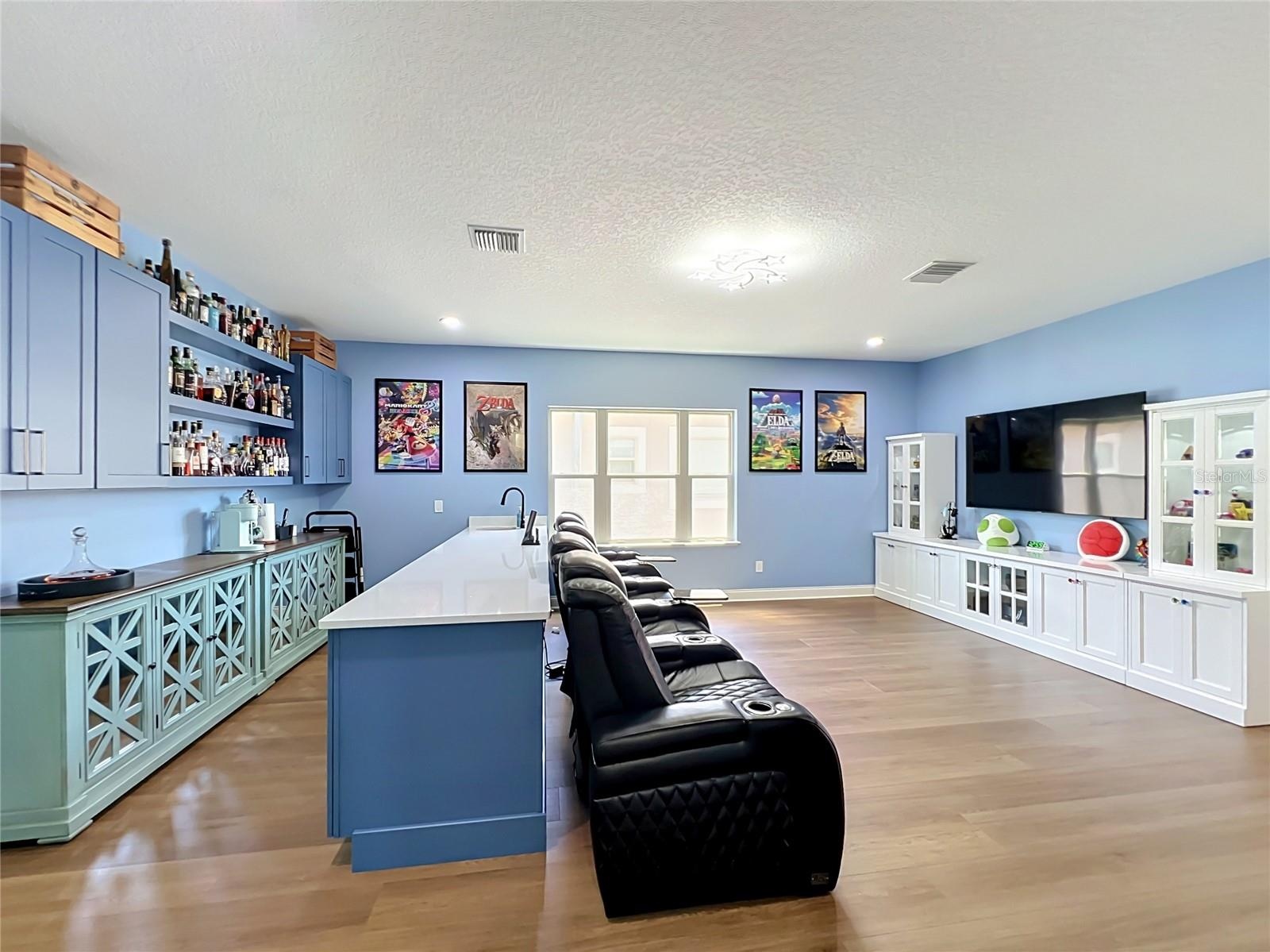 Theater room and bespoke bar area