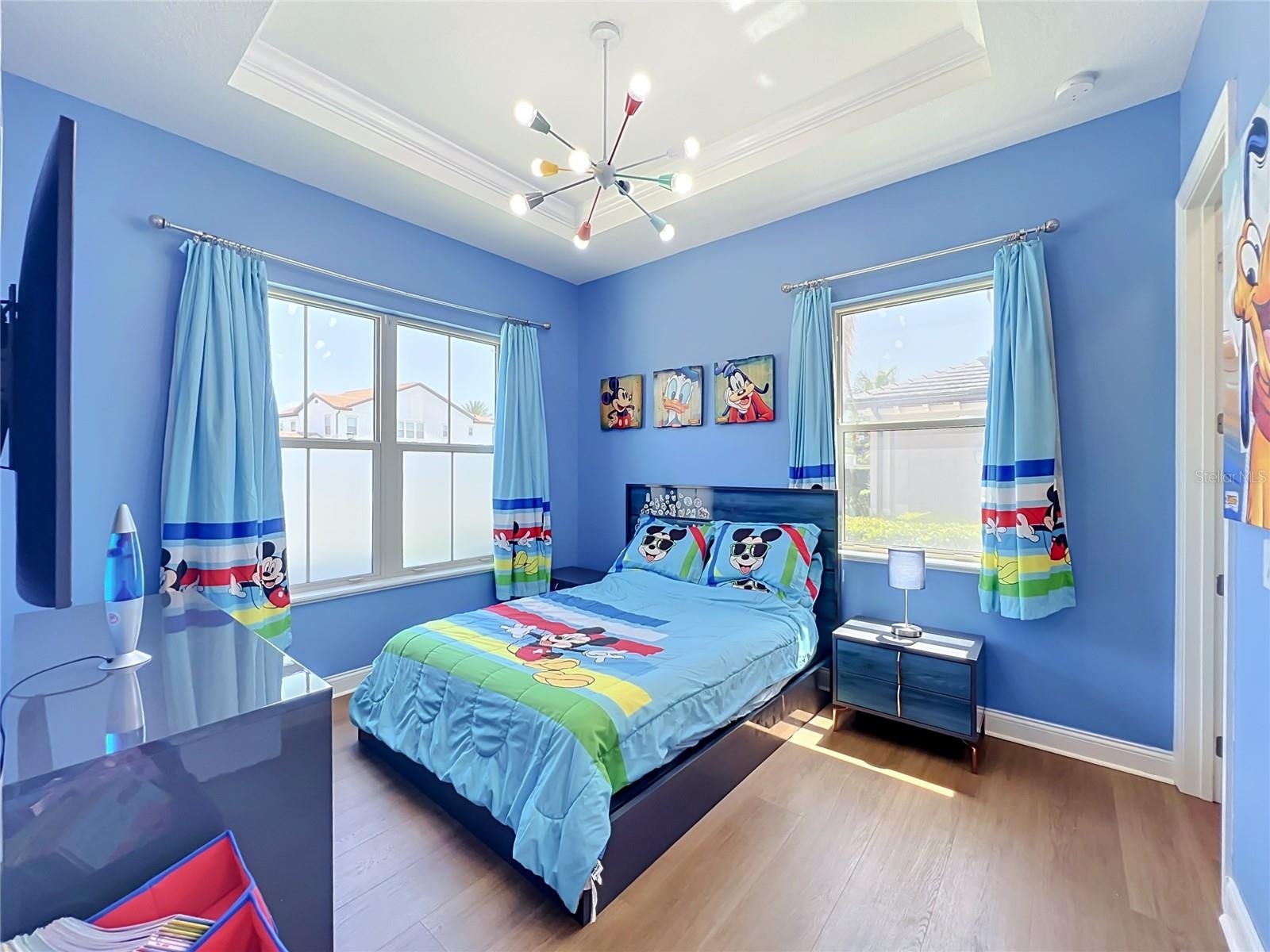 Downstairs bedroom with ensuite bathroom and walk in closet