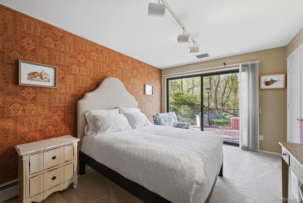 Second bedroom with sliding doors to private deck and beautiful views